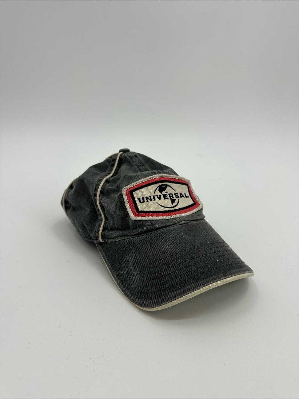 Universal Gray Baseball Cap with Red and Cream Logo Patch